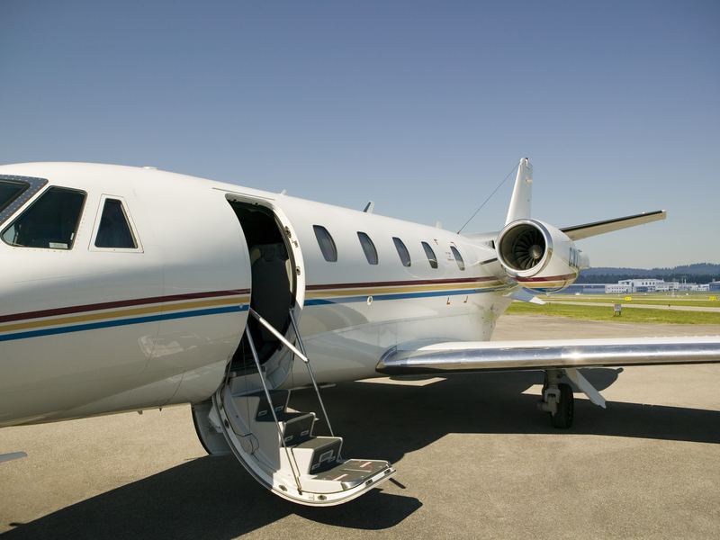 Business jet parked on the tarmac